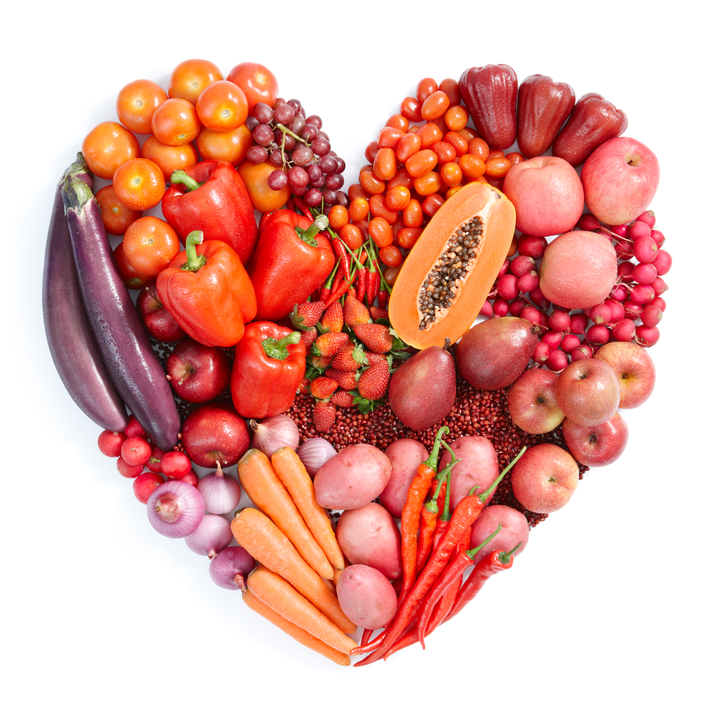 pic of a heart-shaped plate of red and orange vegetables for your healthy diet plan