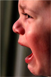 a pic showing a crying child to show the challenges of How to stop emotional eating