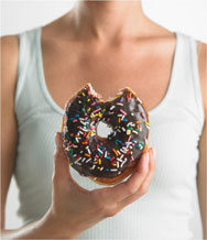 pic of a girl eating a donut