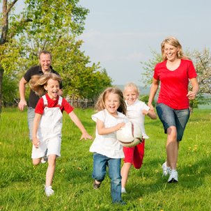 a pic of a happy family walking, to show you  some of the best weight loss exercises