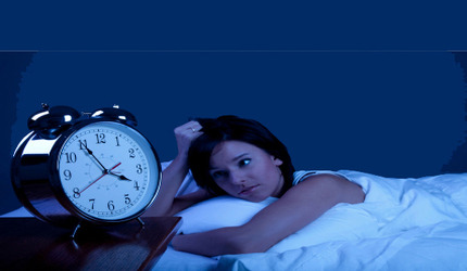 sleep and weight loss a pic of a woman awake at night